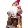 Kalėdinė dekoracija Senelis ant kėdės su LED, 25 cm, 3 spalvos